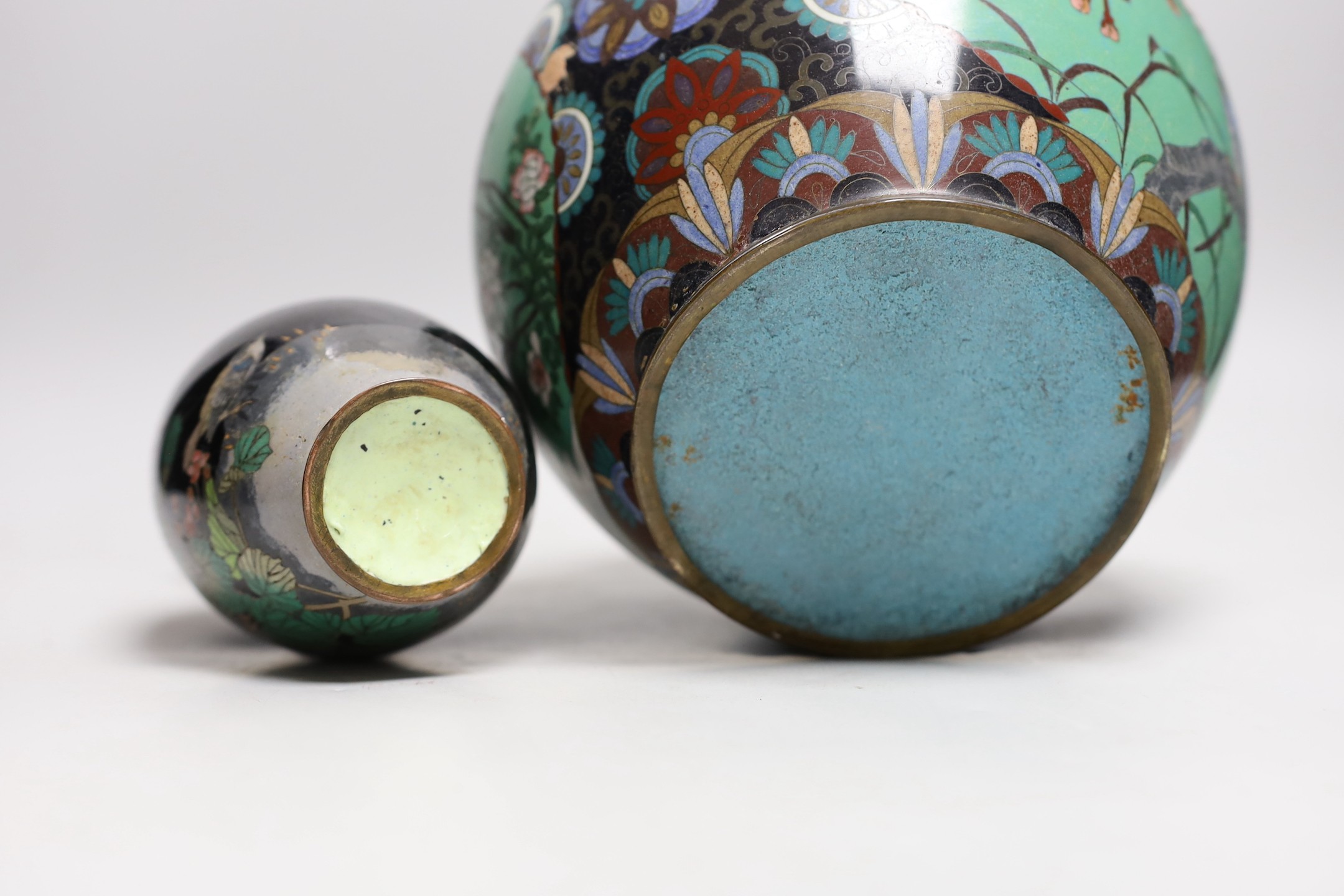 A Japanese cloisonné enamel vase and another smaller vase. Tallest 18cm